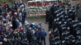 Belarus - Belarusian law enforcement officers surround demonstrators during a rally to reject the presidential election results in Minsk, November 15, 2020