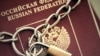 GENERIC – Russian Passports covered with a chain with a golden Lock