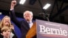 Democratic U.S. presidential candidate Senator Bernie Sanders is accompanied by his wife Jane O’Meara Sanders and other relatives as he speaks at his New Hampshire primary night rally in Manchester