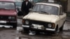 Kazakhstan – bad road, old car in the village Zhomart. Almaty region, Ile district, 03May2013